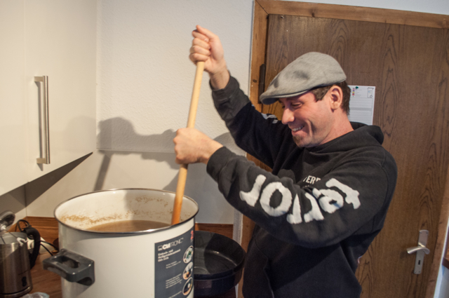 Brewing master stirring